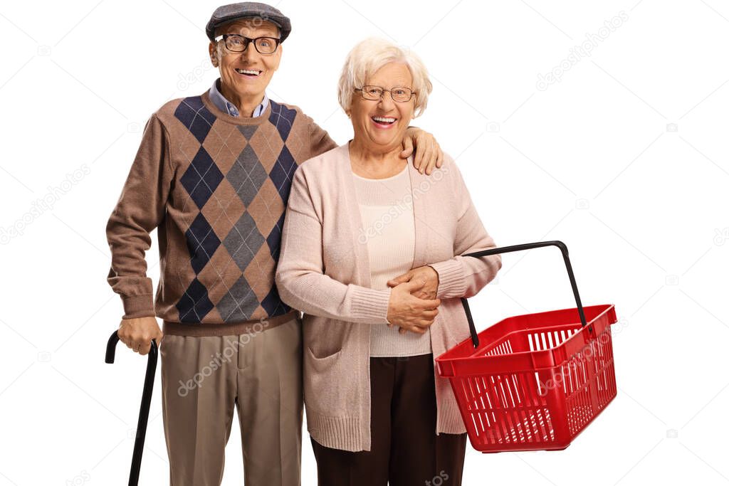 Happy senior couple with an empty shopping basket