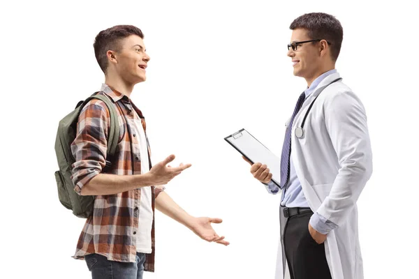 Mannelijke student praat met een arts — Stockfoto