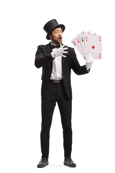 Magician performing a magic trick with playing cards — ストック写真