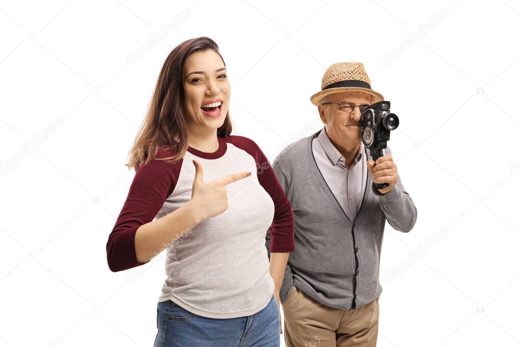 Young casual woman laughing at an elderly man with a vintage rec