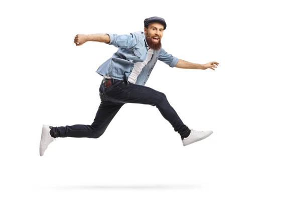 Bearded man in casual clothes jumping — 스톡 사진