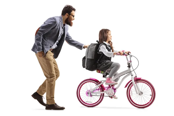 Padre enseñando a una chica a andar en bicicleta —  Fotos de Stock