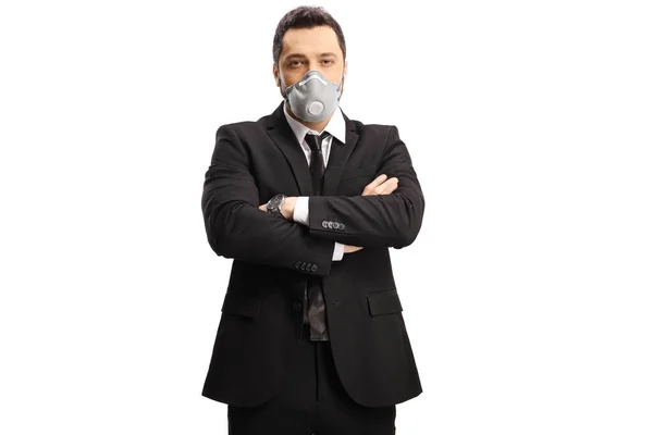 Бизнесмен в маске против загрязнения воздуха — стоковое фото