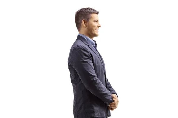 Perfil de un hombre de pie y sonriente — Foto de Stock