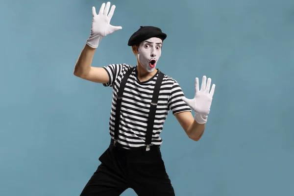 Pantomime Man Touching Imaginary Glass Isolated Blue Background — Stock Photo, Image