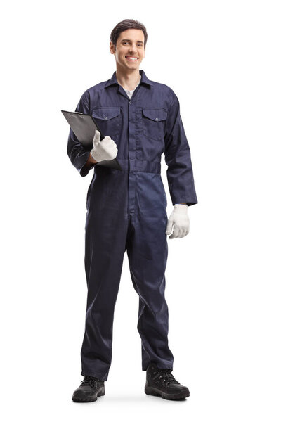 Full length portrait of an auto mechanic holding a clipboard isolated on white background