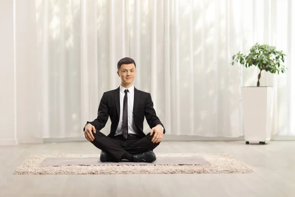 Elegant Guy Black Suit Sitting Crossed Legs Lotus Pose Home — Stock Photo, Image