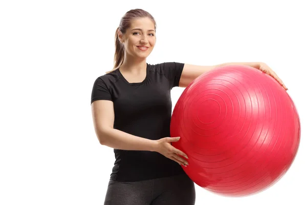 Jovem Posando Com Uma Bola Fitness Vermelha Isolada Fundo Branco — Fotografia de Stock