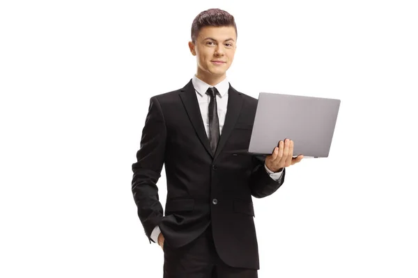 Chico Con Traje Sosteniendo Una Computadora Portátil Sonriendo Cámara Aislado — Foto de Stock