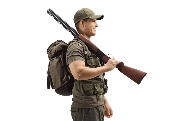 Full Length Profile Shot Young Male Hunter Standing Shotgun His — Stock Photo, Image