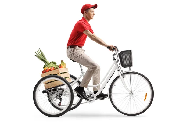 Dostawca Jazdy Rowerze Trzykołowym Skrzynią Owoców Warzyw Białym Tle — Zdjęcie stockowe