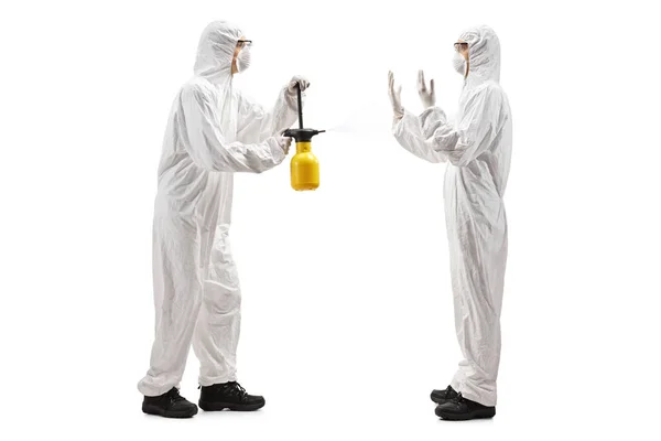 Full Length Profile Shot Man White Protective Suit Spraying Man — Stock Photo, Image