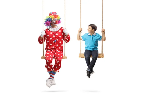 Clown Boy Swinging Swings Looking Eachother Isolated White Background — Stock Photo, Image