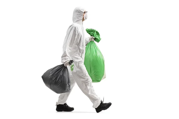 Foto Perfil Completo Hombre Con Traje Protector Caminando Con Bolsas — Foto de Stock