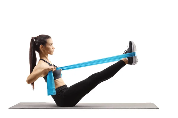 Young Woman Exercising Mat Stretching Legs Elsatic Band Isolated White — Stock Photo, Image