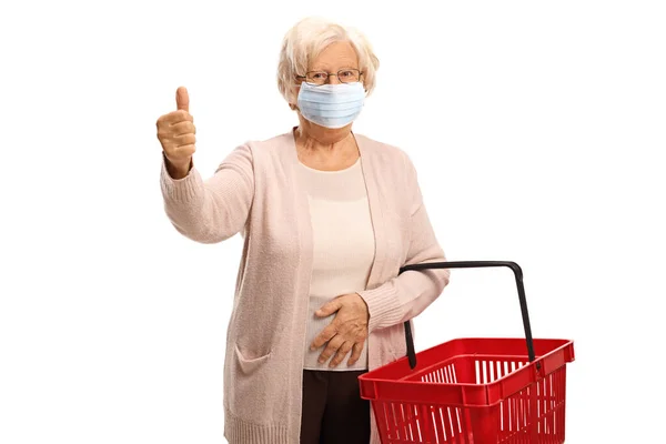 Пожилая Женщина Медицинской Маске Лице Показывает Большой Палец Вверх Знак — стоковое фото