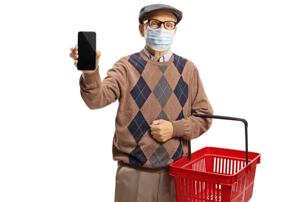 Elderly Man Medical Face Mask Showing Mobile Phone Carrying Shopping — Stock Photo, Image