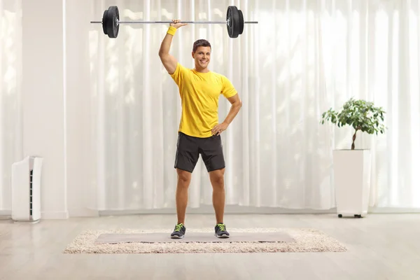 Full Length Portrait Young Fit Man Lifting Weigths Home — Stockfoto