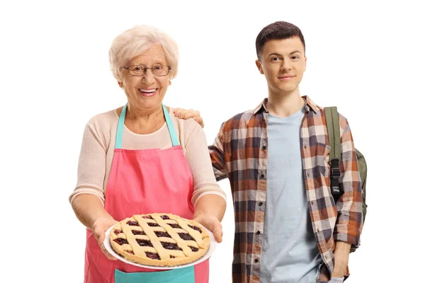 Grandson Standing Next His Grandmother Holding Pie Isolated White Background — Stock Photo, Image