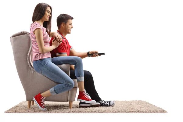 Young Female Male Sitting Armchair Holding Remote Control Isolated White — Stock Photo, Image