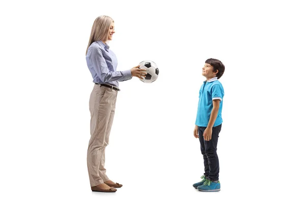 Full Length Shot Woman Giving Soccer Ball Boy Isolated White — Stock Photo, Image