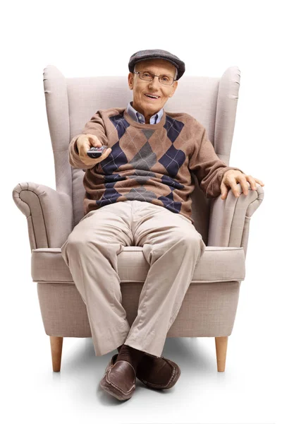 Full Length Portrait Senior Man Sitting Armchair Using Remote Control — Stock Photo, Image