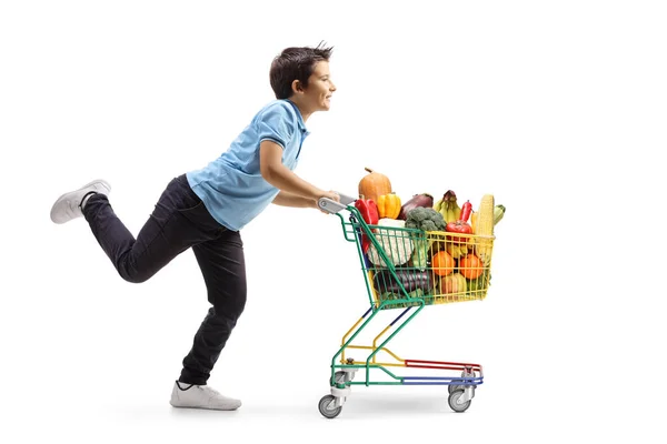 Beyaz Arka Planda Meyve Sebzelerle Dolu Küçük Bir Alışveriş Arabasını — Stok fotoğraf