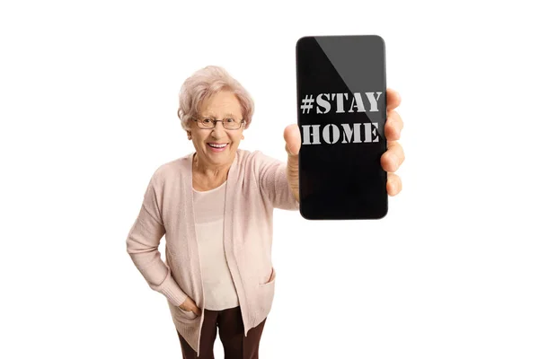 Oudere Vrouw Gepensioneerde Met Een Telefoon Met Bericht Zeggen Blijf — Stockfoto