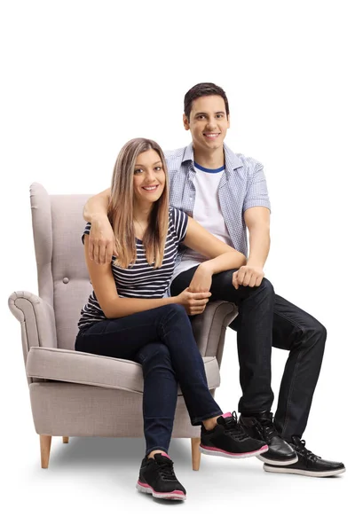 Young Couple Sitting Armchair Smiling Camera Isolated White Background — Stock Photo, Image