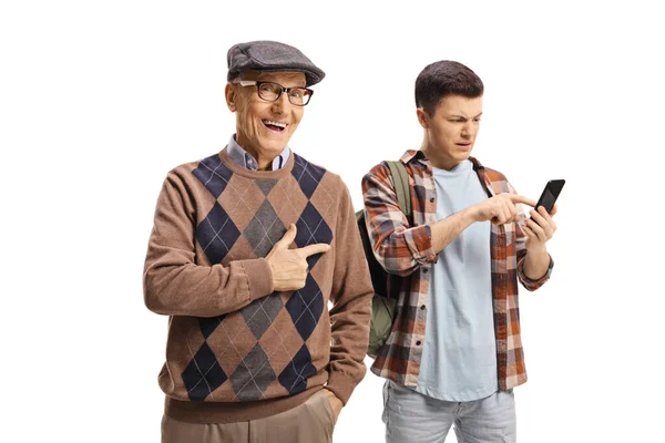 Senior Man Laughing Pointing Young Guy Using Mobile Phone Isolated — Stock Photo, Image