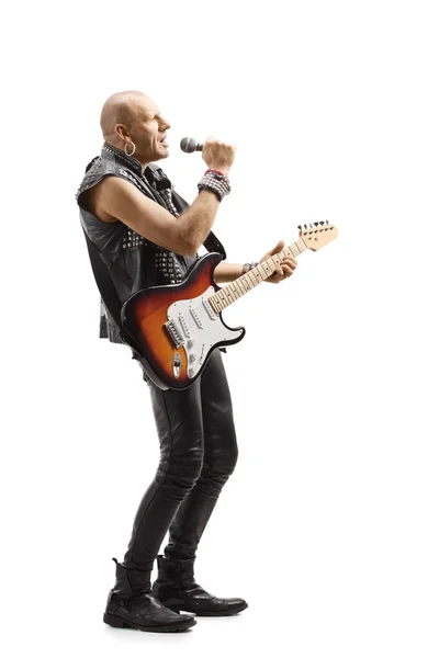 Pełna Długość Zdjęcie Profilu Męskiej Gwiazdy Rocka Mikrofonem Gitara Elektryczna — Zdjęcie stockowe