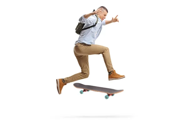 Studente Maschio Che Salta Con Uno Skateboard Isolato Sfondo Bianco — Foto Stock