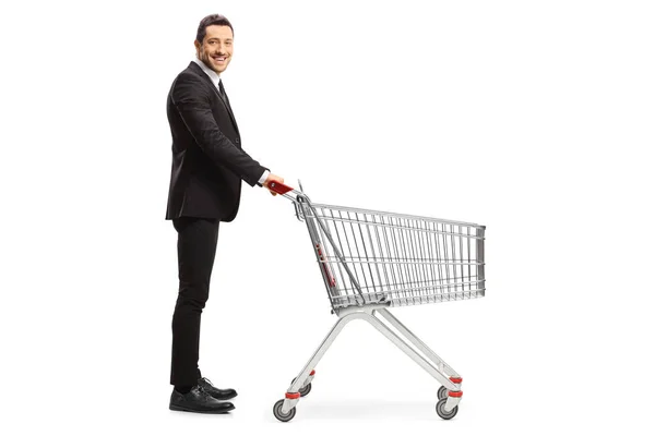 Full Length Profile Shot Businessman Empty Shopping Cart Isolated White — Stock Photo, Image