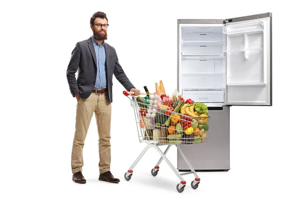 Ganzkörperporträt Eines Bärtigen Mannes Der Einen Kühlschrank Mit Lebensmitteln Auf — Stockfoto