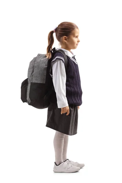 Full Length Profil Záběr Školačky Školní Uniformě Nesoucí Batoh Izolovaný — Stock fotografie