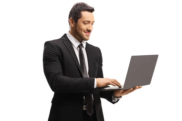 商人使用白色背景隔离的笔记本电脑 — 图库照片
