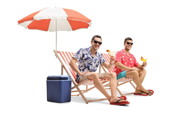 Two Young Men Drinking Cocktails Sitting Umbrella Isolated White Background — Stock Photo, Image