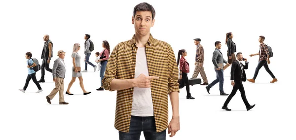 Confused Young Man Pointing Crowd People Walking Different Directions Isolated — Stock Photo, Image