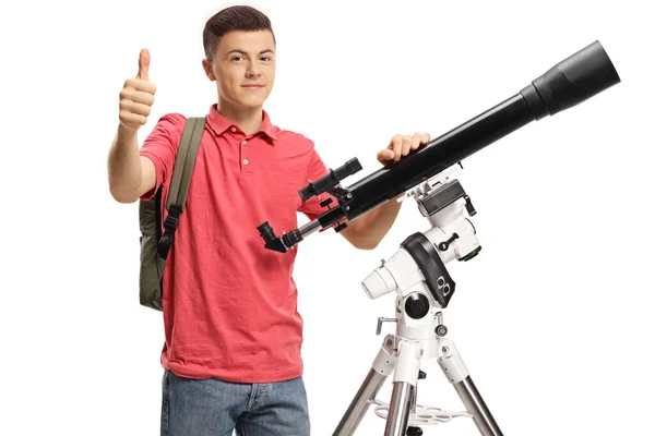 Studente Maschio Con Telescopio Che Mostra Pollici Isolato Sfondo Bianco — Foto Stock