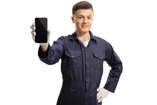 持有白色背景隔离手机的年轻技师 — 图库照片