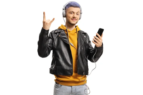 Jovem Hipster Cara Ouvindo Música Fones Ouvido Gestos Rock Roll — Fotografia de Stock