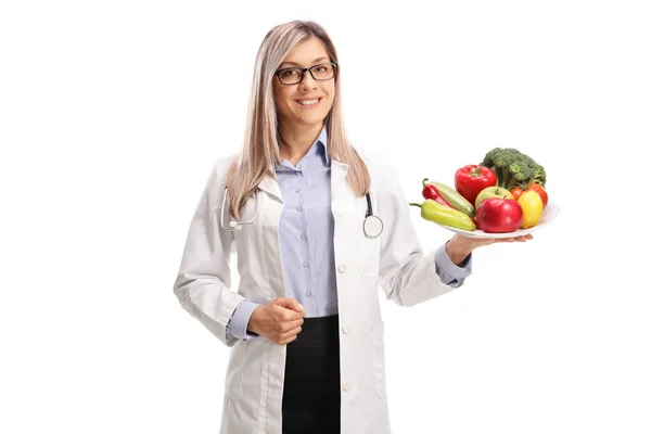 Female Doctor Holding Plate Fresh Fruits Vegetables Isolated White Background — Stock Photo, Image