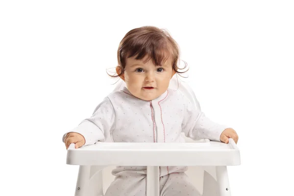 Menina Bonito Sentado Uma Cadeira Alimentação Isolada Fundo Branco — Fotografia de Stock