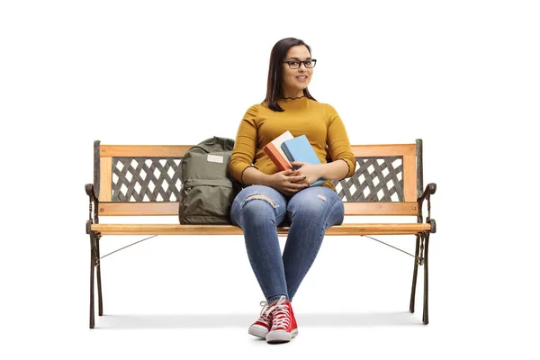 Vrouwelijke Student Zit Een Bank Houdt Boeken Geïsoleerd Witte Achtergrond — Stockfoto