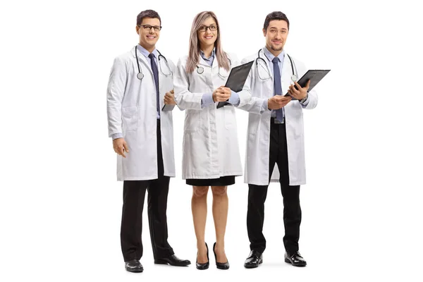 Full Length Portrait Team Young Doctors Posing Smiling Camera Isolated — Stock Photo, Image