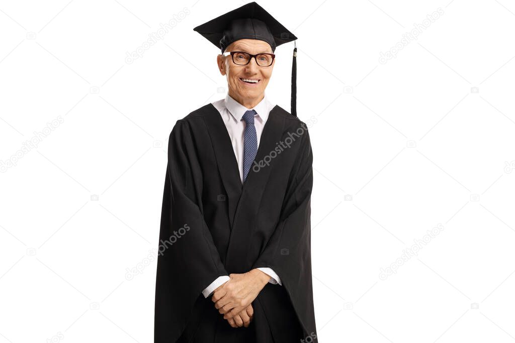 Elderly male graduate wearing a gown and smiling isolated on white background