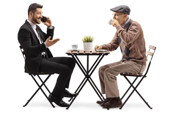 Businessman Talking Mobile Phone Sitting Coffee Table Elderly Man Isolated — Stock Photo, Image