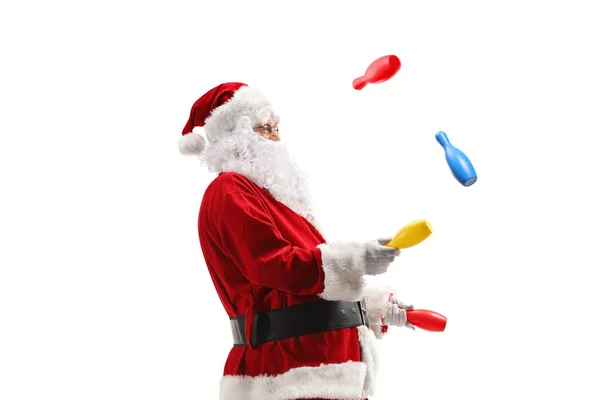 Weihnachtsmann Jongliert Isoliert Auf Weißem Hintergrund — Stockfoto