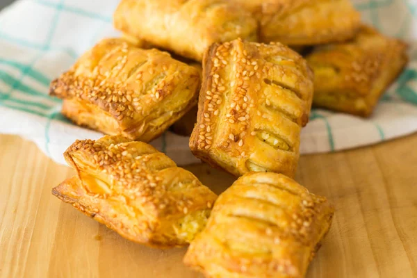 Fried patties with puff pastry cheese. Bakery products.