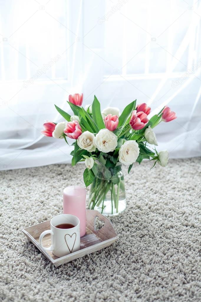 Romantic breakfast. Bouquet of flowers. Roses and tulips. Spring. Valentine's Day. International Women's Day. Cozy.